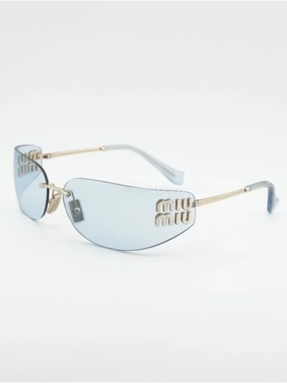 Miu Miu MUA51S ZVN10P Sunglasses Pale Gold Rectangle Frame, Light Blue Lenses